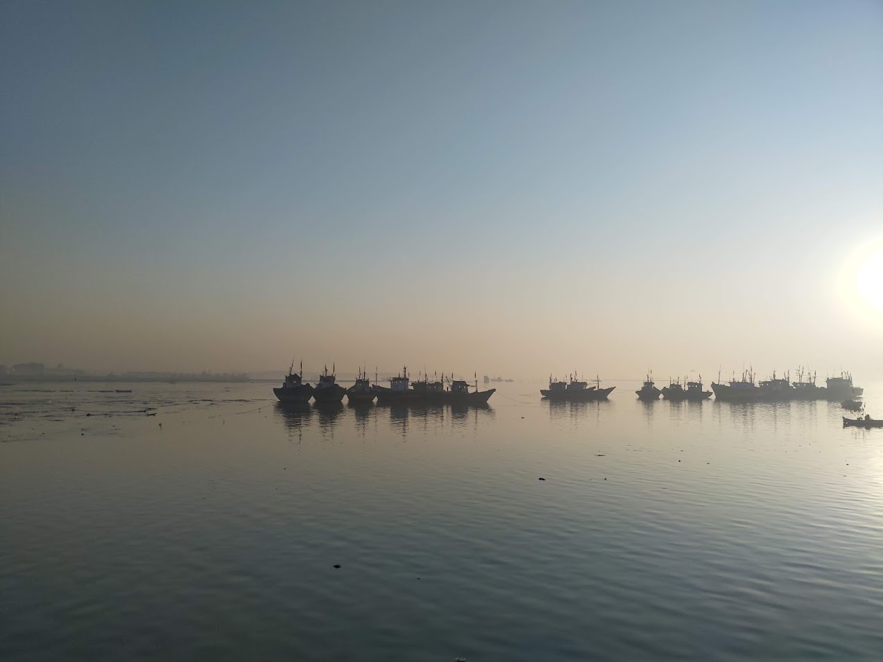 Cycles loaded on a barge crossing on the Konkan coast